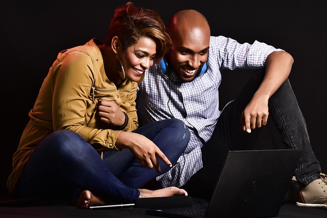 man and woman smiling