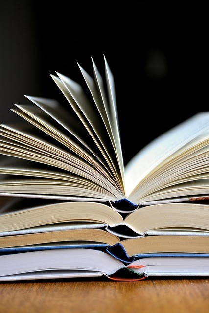 a pile of open books