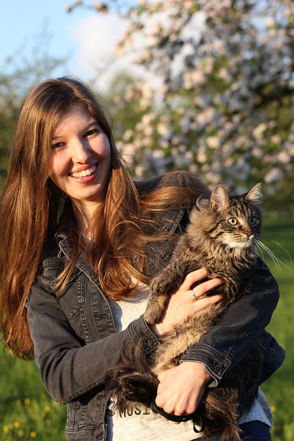 smiling woman with a cat